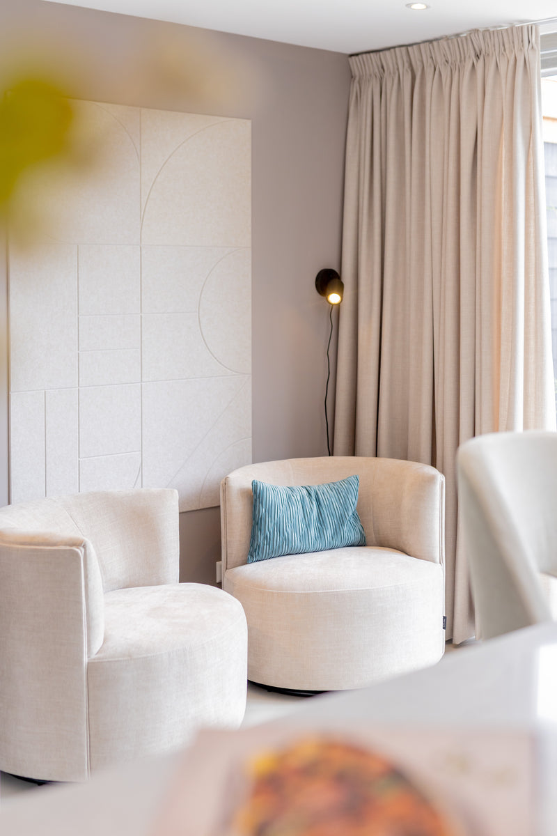 Beige felt wall panels featured on SBS6 television, on the side in the living room.